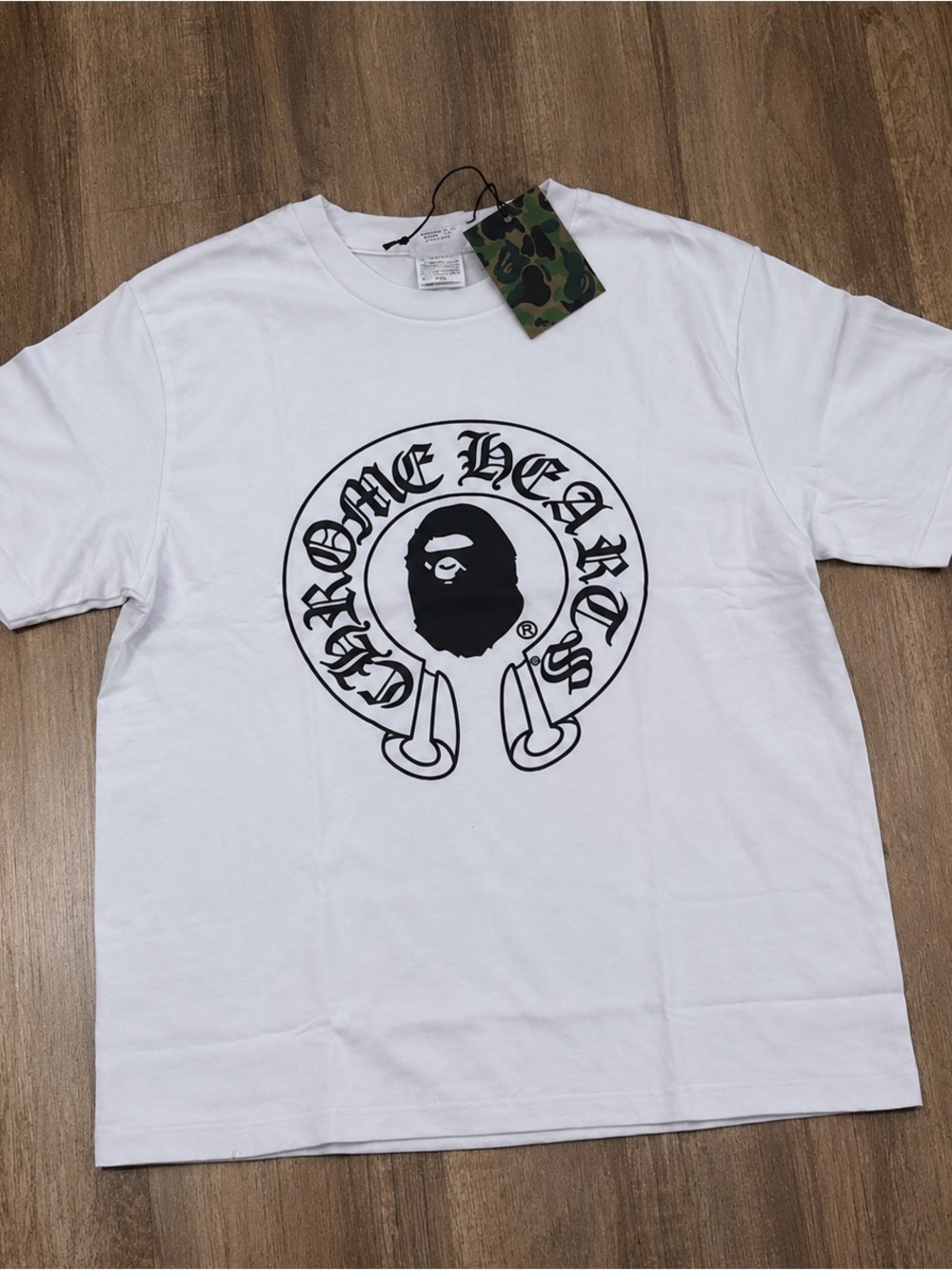 White chrome heart and bape collab